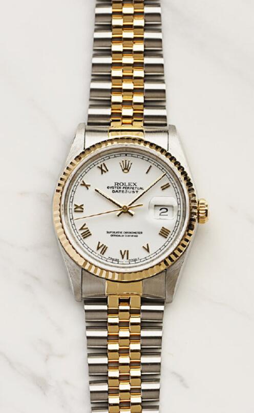 Elegant feeling is assured by the Roman numerals.